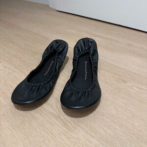 Black faux leather ballet flats